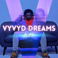 the cover of vydd dreams with a man sitting on a couch